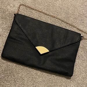 Atmosphere Black Clutch with Gold Accent